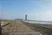 The runway with buildings and hangars